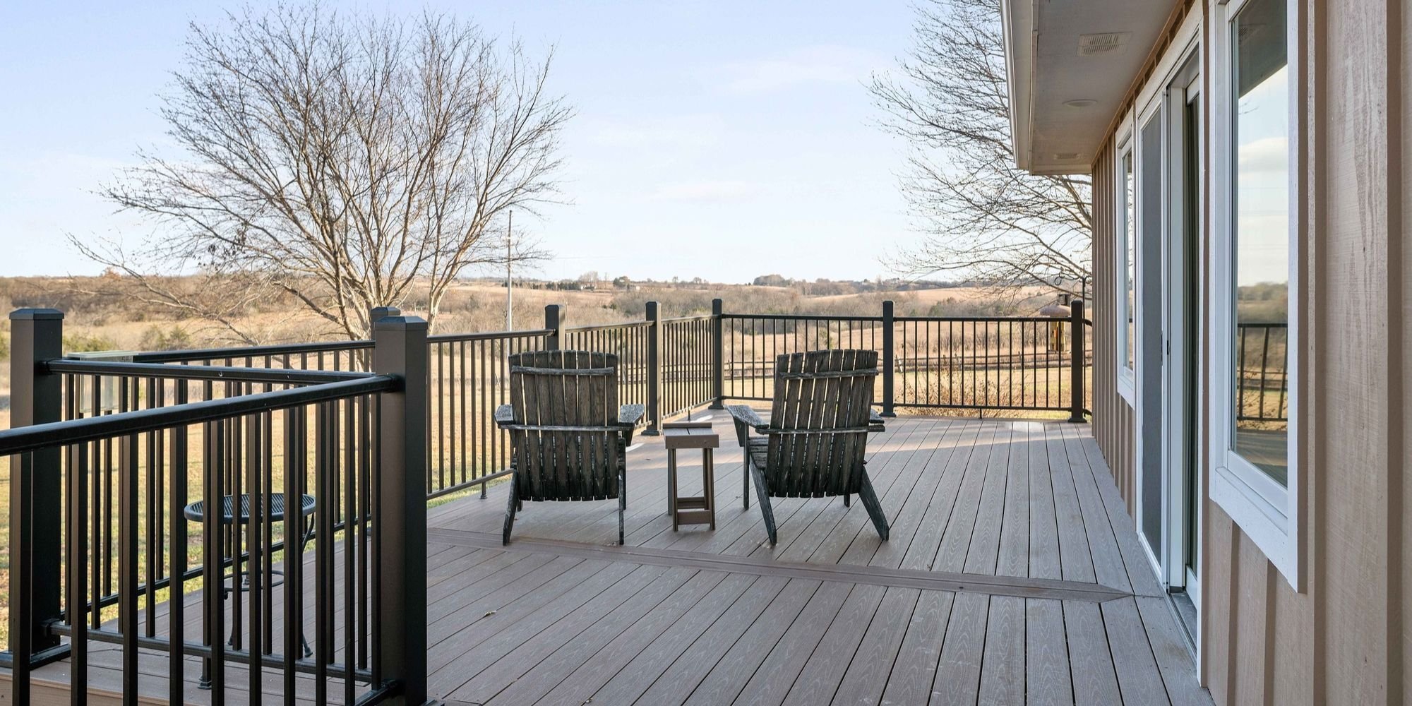 Deck remodel in Manhattan, KS with new deck boards and siding by Fox Home Innovations