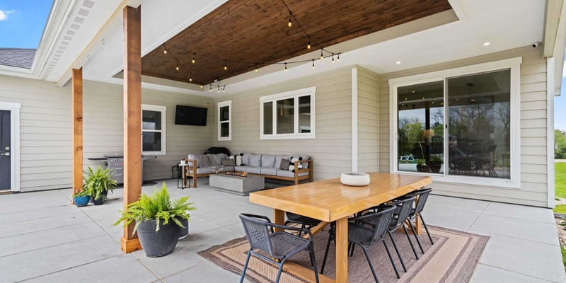 Image of a back patio with new siding on the house remodel by Fox Home Innovations in Manhattan, KS