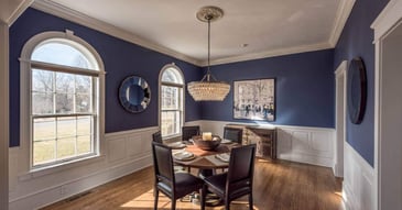 A dining room with new windows and natural lighting in Manhattan, KS by Fox Home Innovations