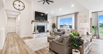 Remodeled living room with stone feature fireplace in Manhattan, by Fox Home Innovations