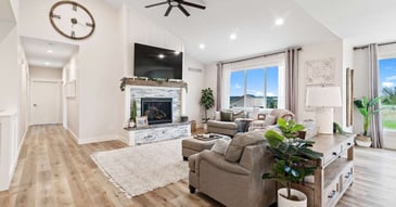 Remodeled living room with stone feature fireplace in Manhattan, by Fox Home Innovations