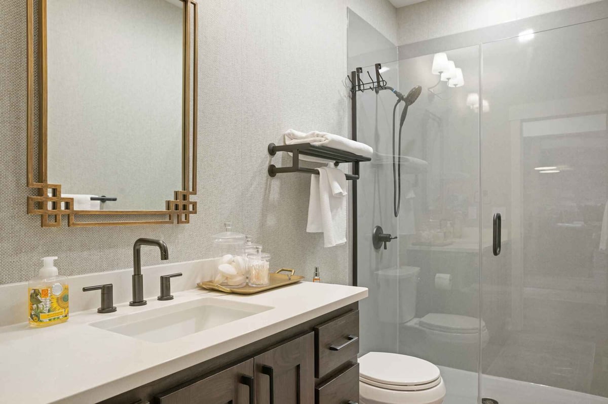 guest bathroom remodel with modern vanity and mirror