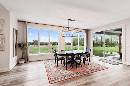 dining room with open large windows and dark table in manhattan kansas