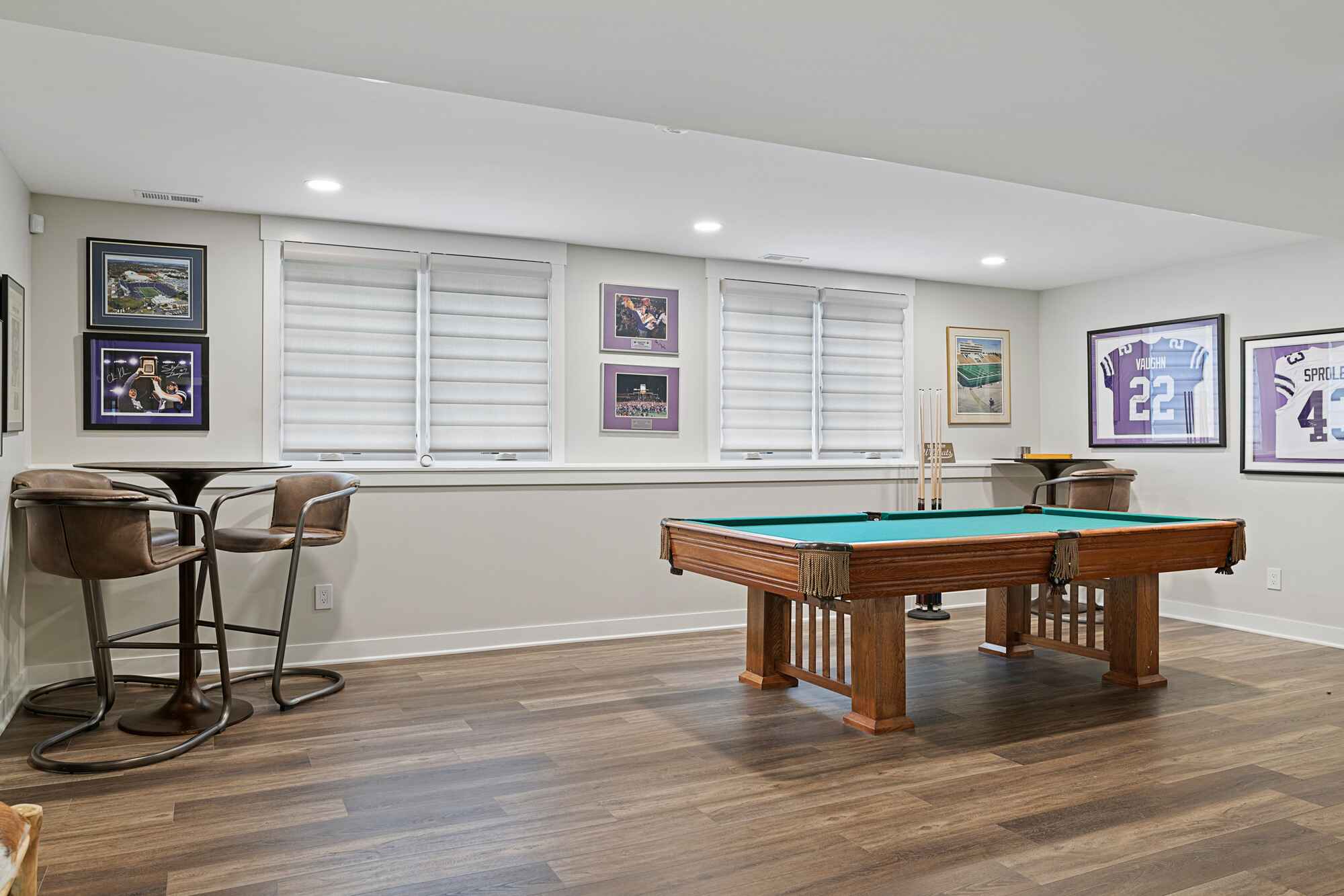 basement recroom remodel with hardware floors and pool table