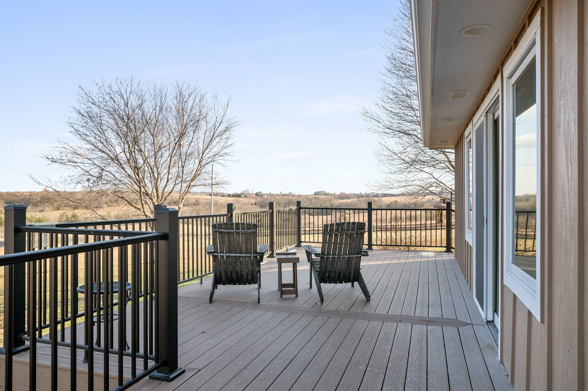 deck remodel in manhattan kansas with black railing