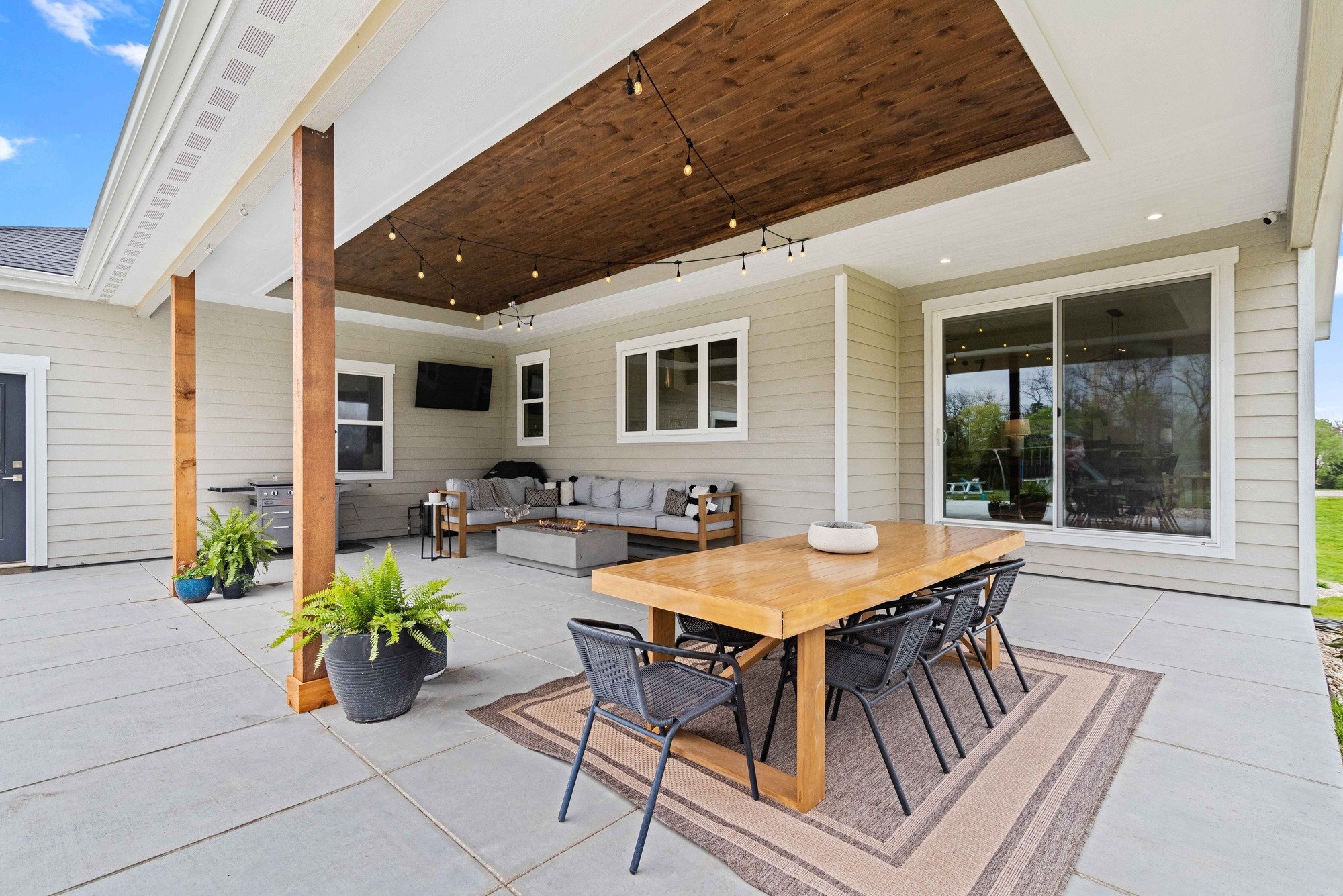 whole home remodel exterior patio with wood beams