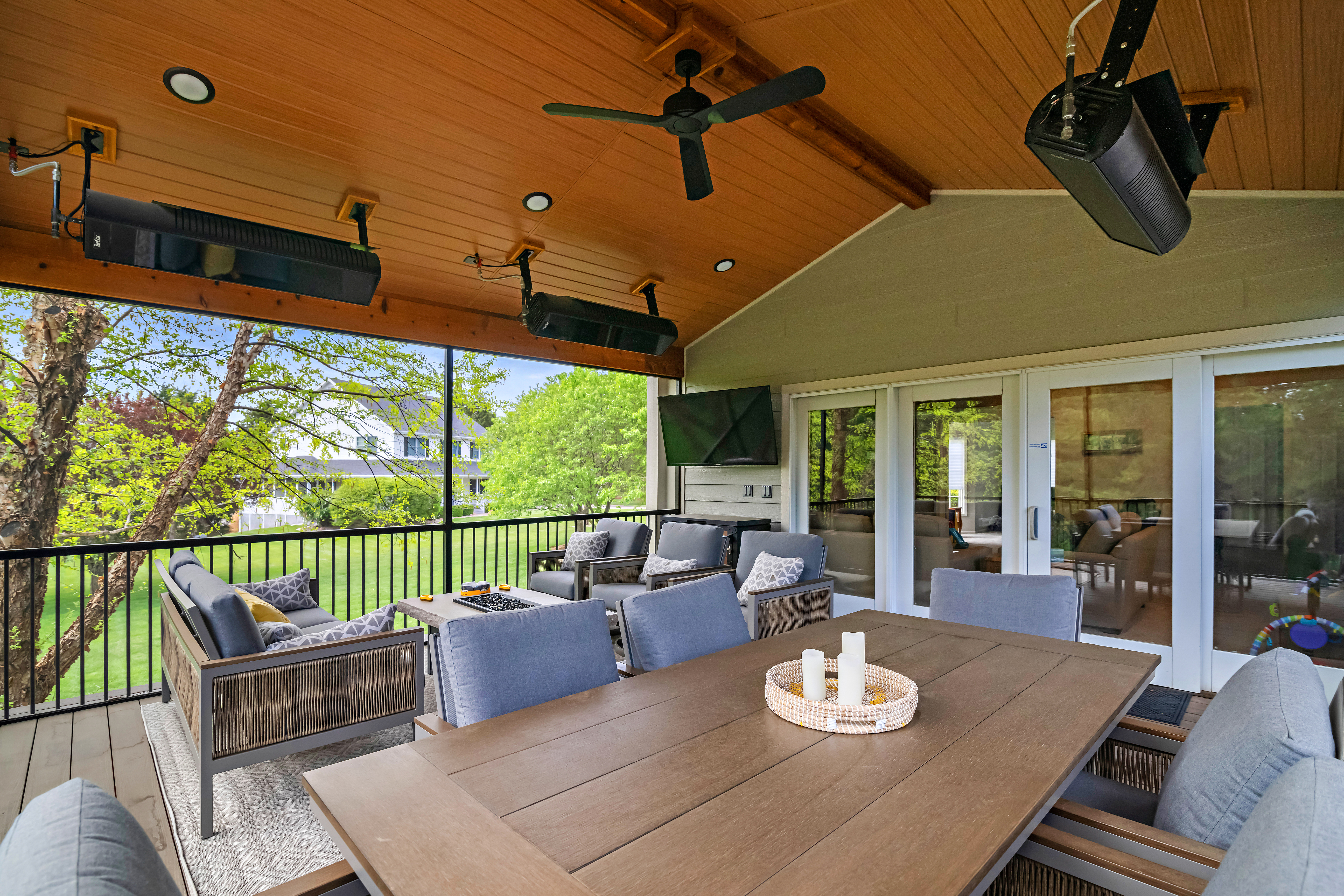 home remodel in manhattan kansas showing sunroom with wood ceiling and patio furniture